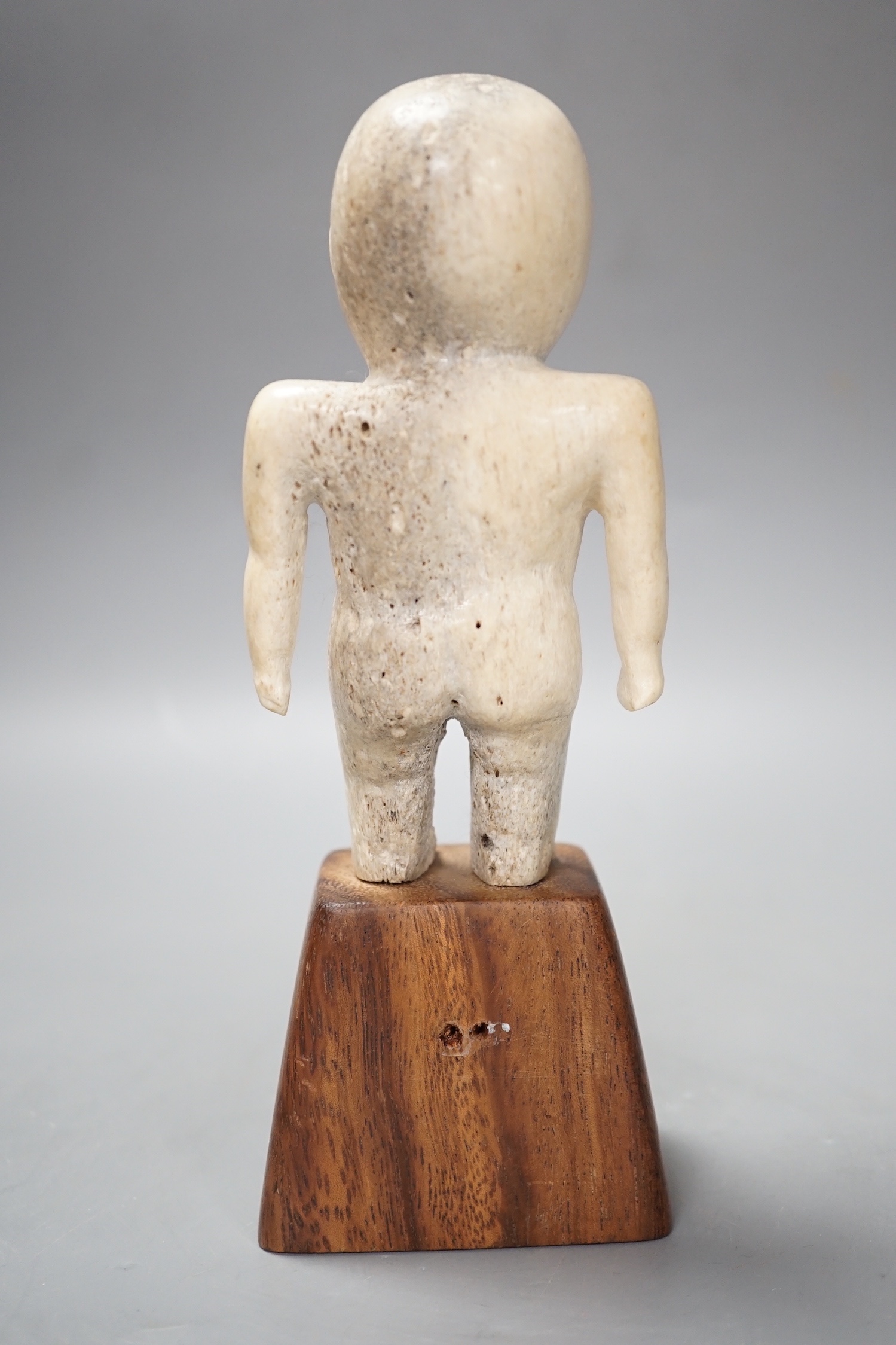 A Polynesian? Marine bone figure, 20 cms high.